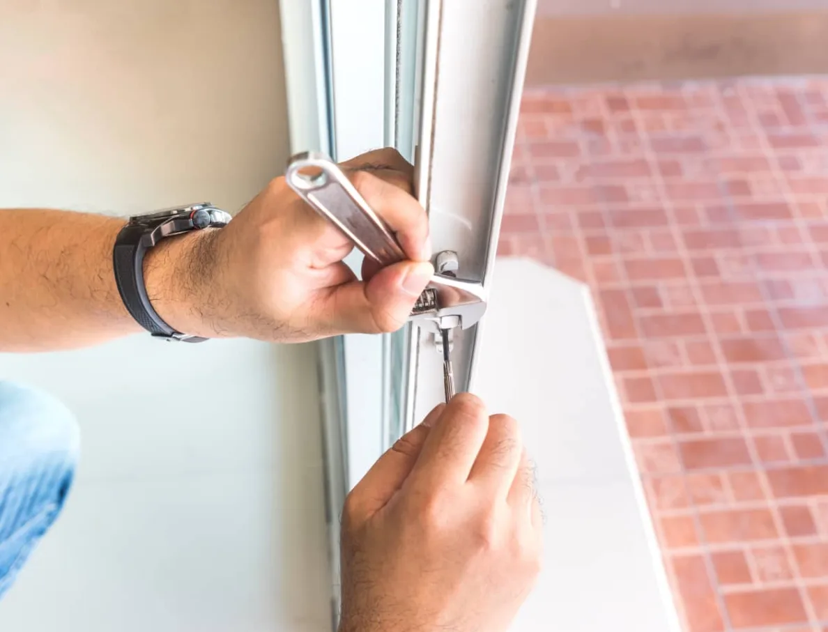 Locksmith replacing mortise lock on sliding glass patio door in Plantation and surrounding cities home