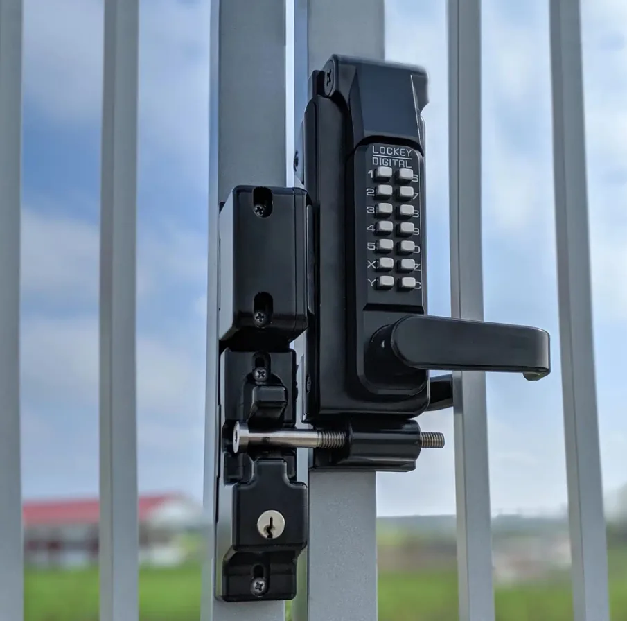 Heavy duty gate lock installation on residential driveway gate in Boca Raton FL by Triton Locksmith